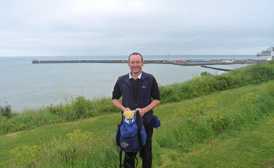 Dr Spencer joins local resident on charity walk from Dover to Dungeness